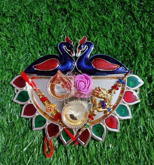Picture of Roli Chawal Peacock Thali with 2 Rakhi
